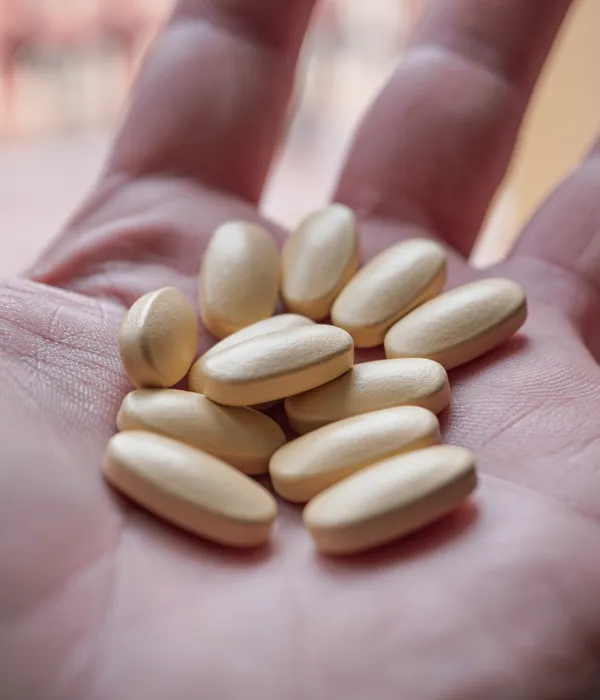 lost angels drug detox person holding handful almonds