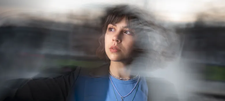 lost angels drug detox woman blue shirt black jacket