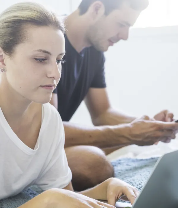 lost angels internet addiction man woman sitting floor looking laptop