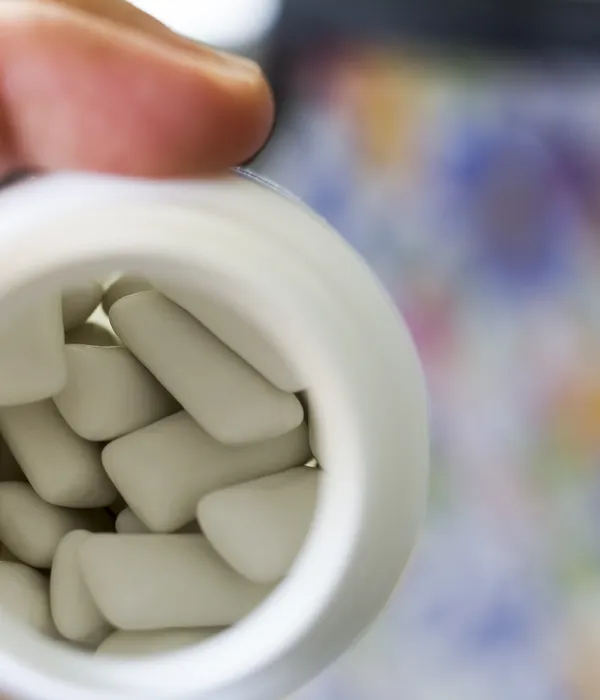 lost angels prescription drug person holding pill hand