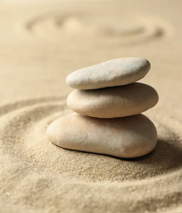 lost angels yoga pile stones sandy beach