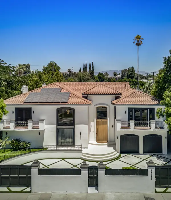 lost-angels-white-house-red-roof-large-driveway-page